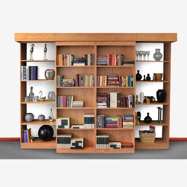 Full-wall library shelving unit that hides a secret double murphy bed behind sliding bookshelves