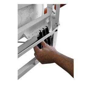 Close-up of a technician assembling a steel bed frame for a high-quality wall bed system